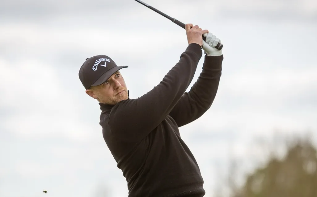 Craig Lockwood, Head Professional at Lockwood Academy, hitting a golf shot