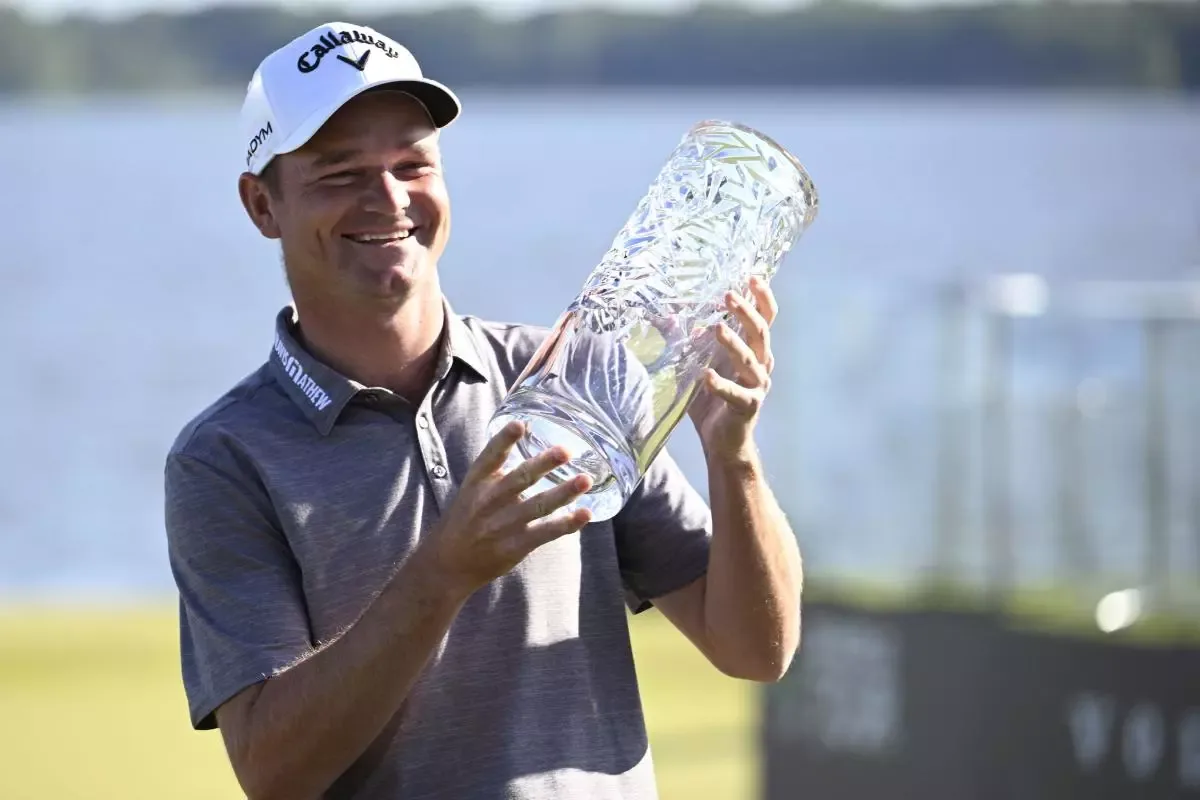 Professional golfer Craig Lockwood has worked with holding a DP World Tour trophy
